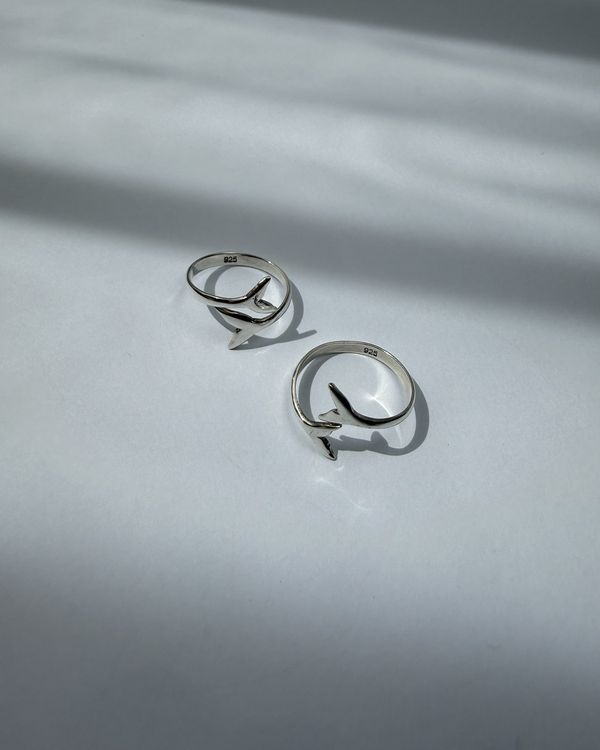 Segara ring: a sterling silver wrap band ending in a whale tail